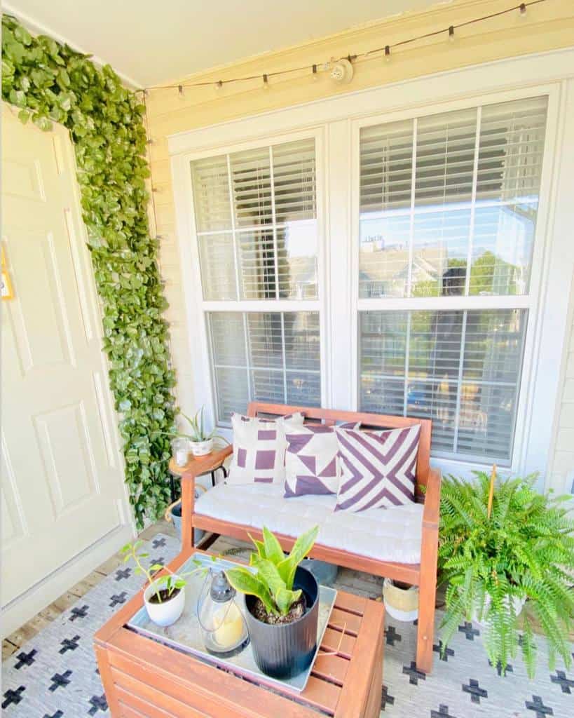 small covered patio wood seat wall plants