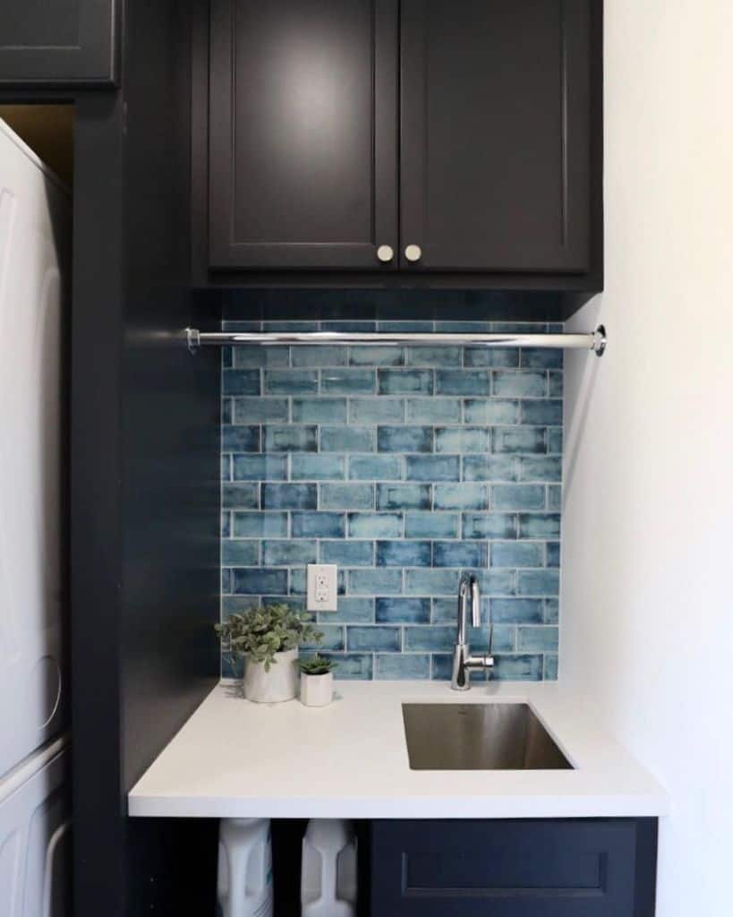 small-laundry-room-sink-ideas-juliebylerremodel small laundry sink blue wall tiles