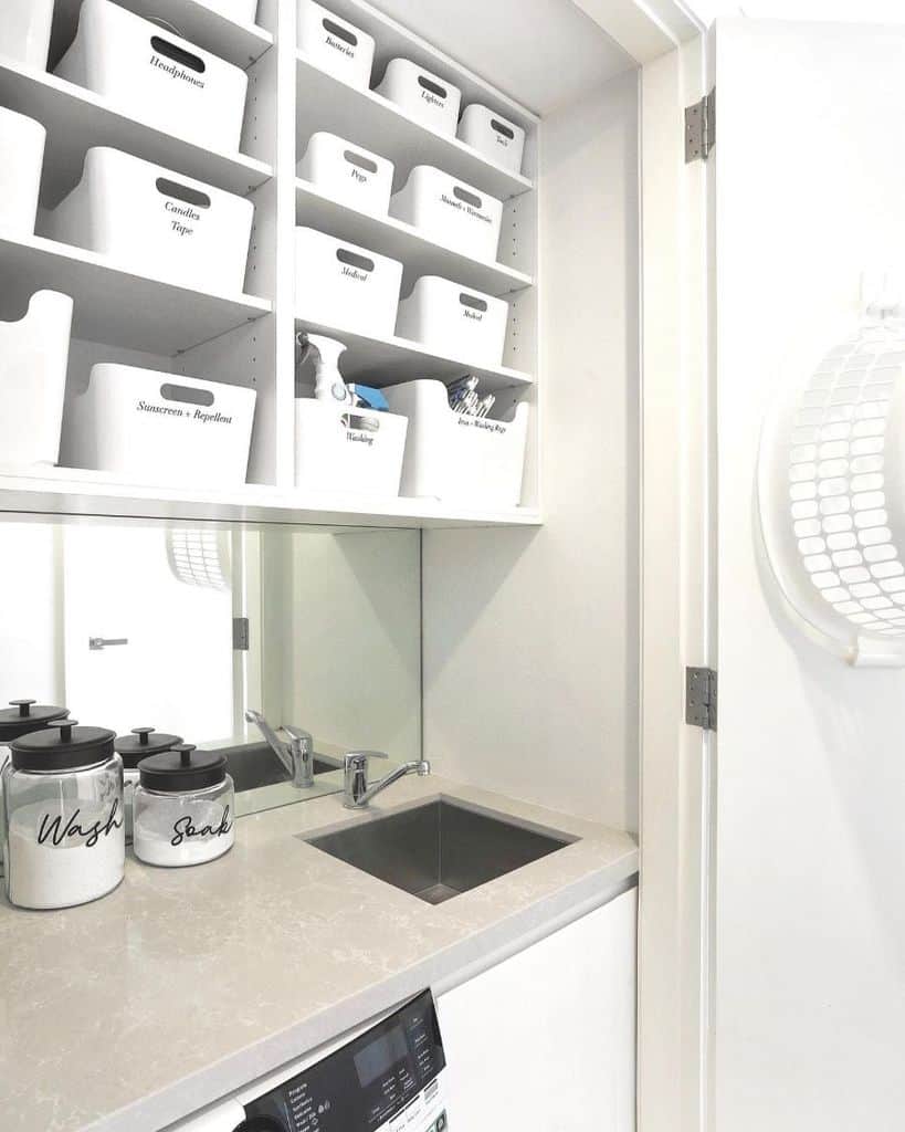small-laundry-room-sink-ideas-theorganizedlife small laundry room sink wall storage