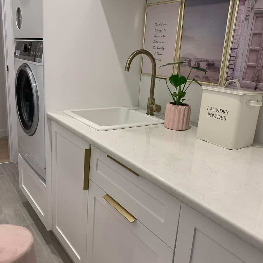 small-laundry-room-sink-ideas-today_tomorrow_forever_home small luxury laundry with washer sink and gold accents