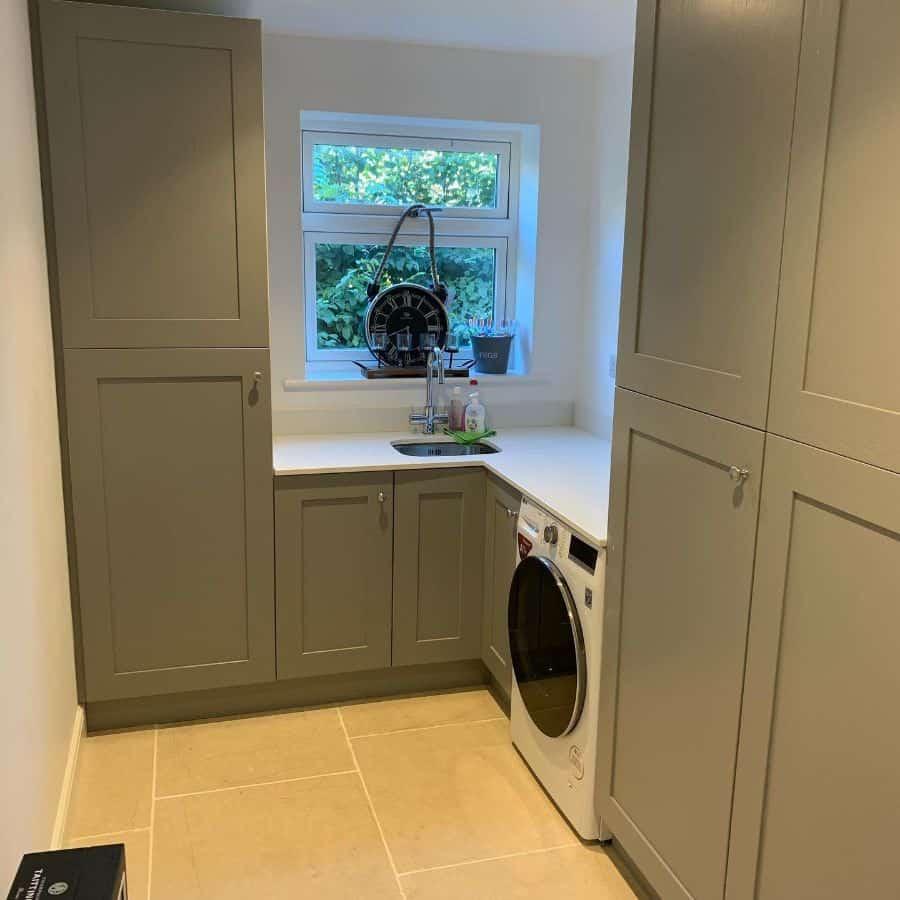 small-laundry-room-sink-ideas-york_fixer_upper small laundry room gray cabinets sink and washer