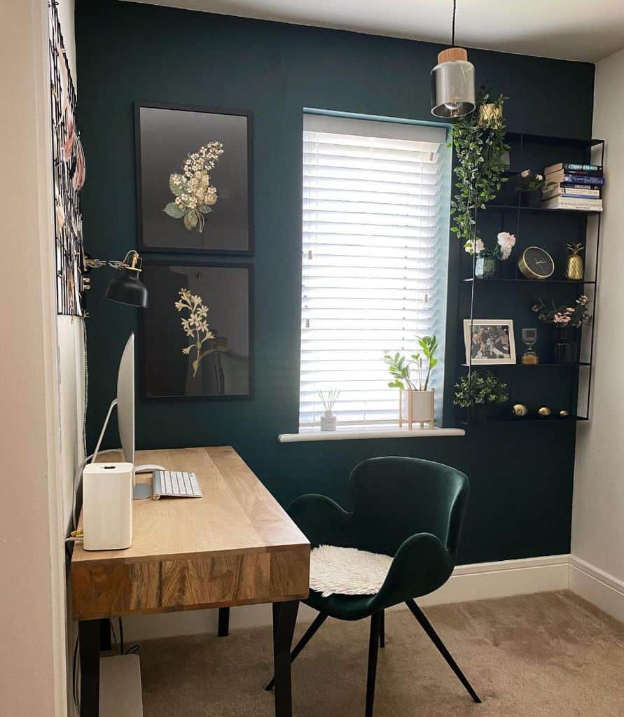 small home office with green accent wall