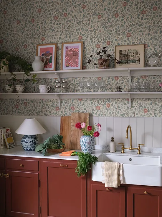 Soft Floral Wallpaper with Terracotta Cabinets