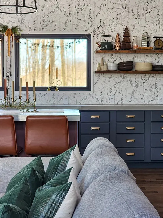 Sprig Wallpaper with a Navy Kitchen and Leather Seating