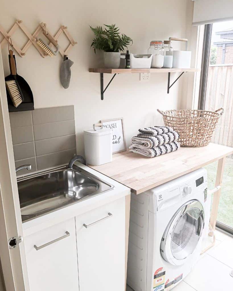 stainless-steel-laundry-room-sink-ideas-homeandtribe_ stainless steel sink in country style laundry