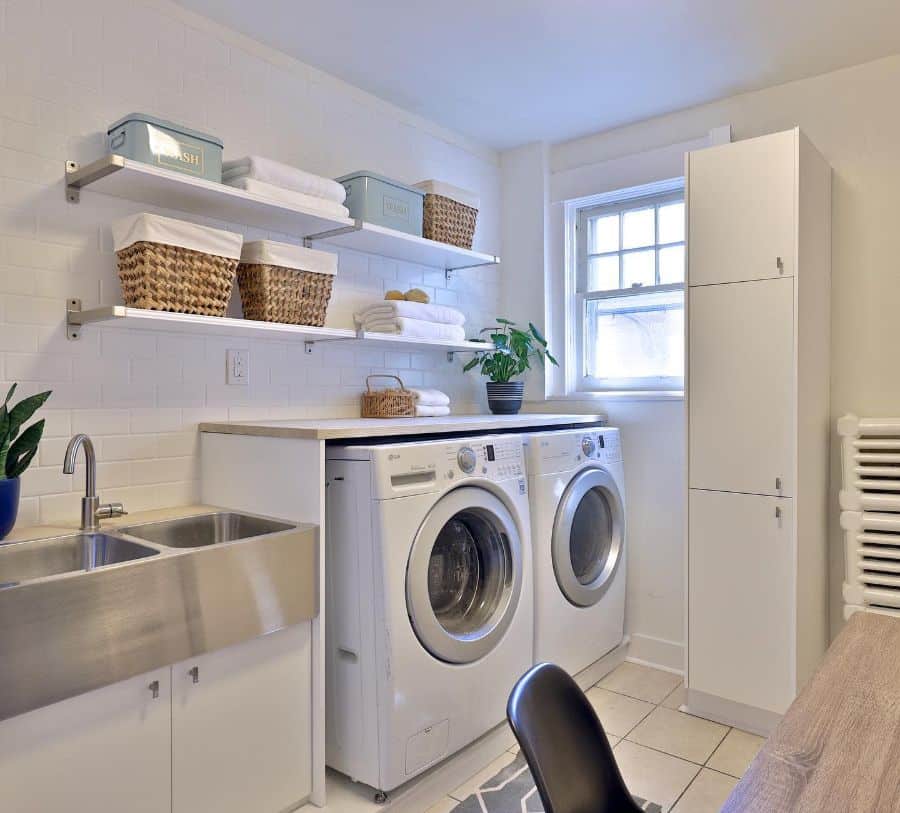 stainless-steel-laundry-room-sink-ideas-mhthompsonhome white brick laundry with stainless steel sink and washer and dryer