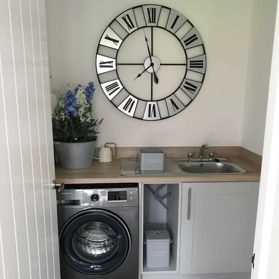 stainless-steel-laundry-room-sink-ideas-our_bellway_plane large wall clock in small laundry