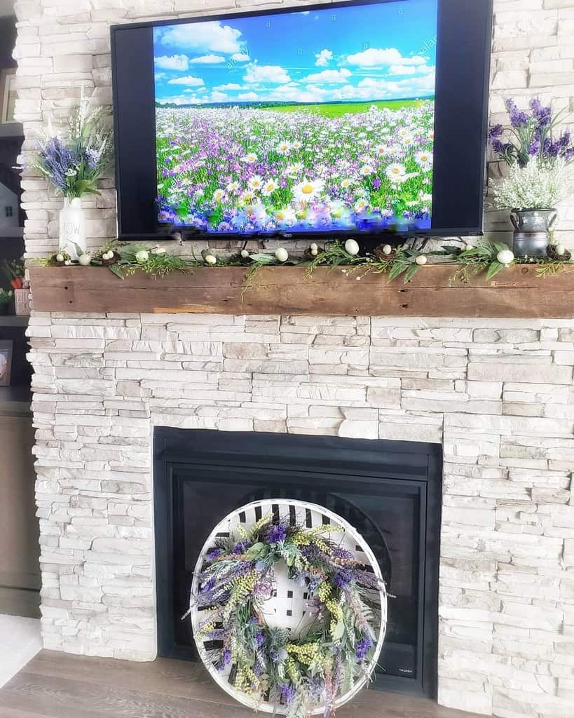 stone-fireplace-wall-ideas-redbarninspiredfarmhouse stone fireplace wood beam mantle wall mounted tv lavender