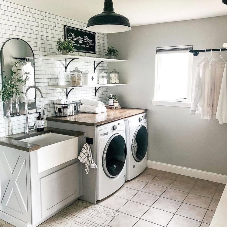 Stylish White Laundry Room with Cute Shelving and Sink