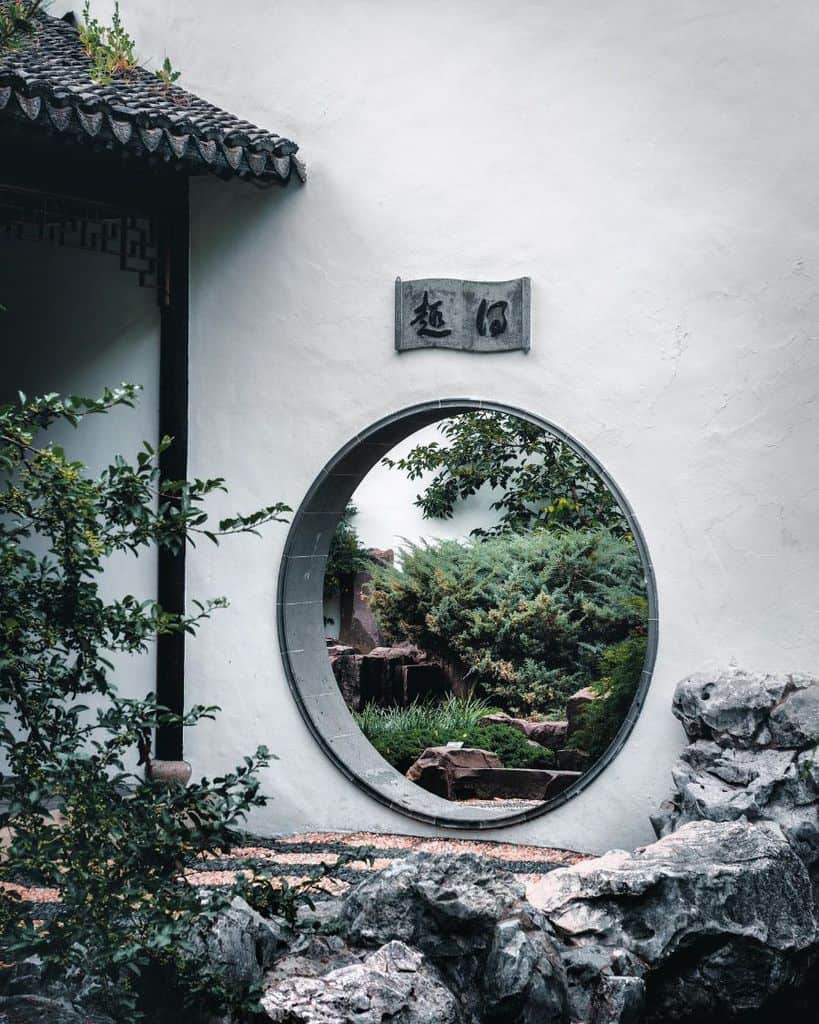 traditional-zen-garden-ideas-hulaskull traditional japanese garden circular entryway through white wall
