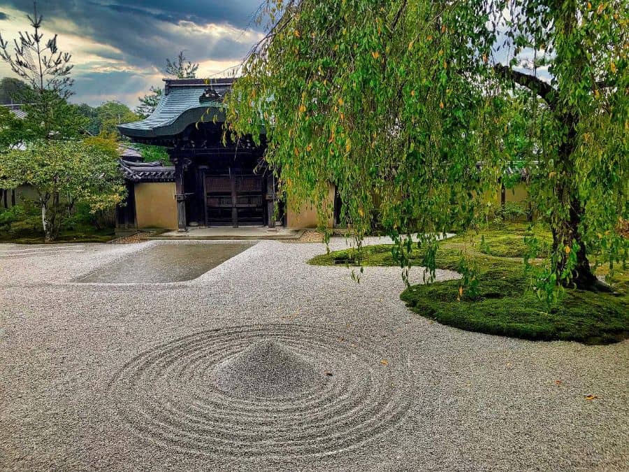 traditional-zen-garden-ideas-stroll-with_-mel_ large traditional japanese rake garden with circular pattern