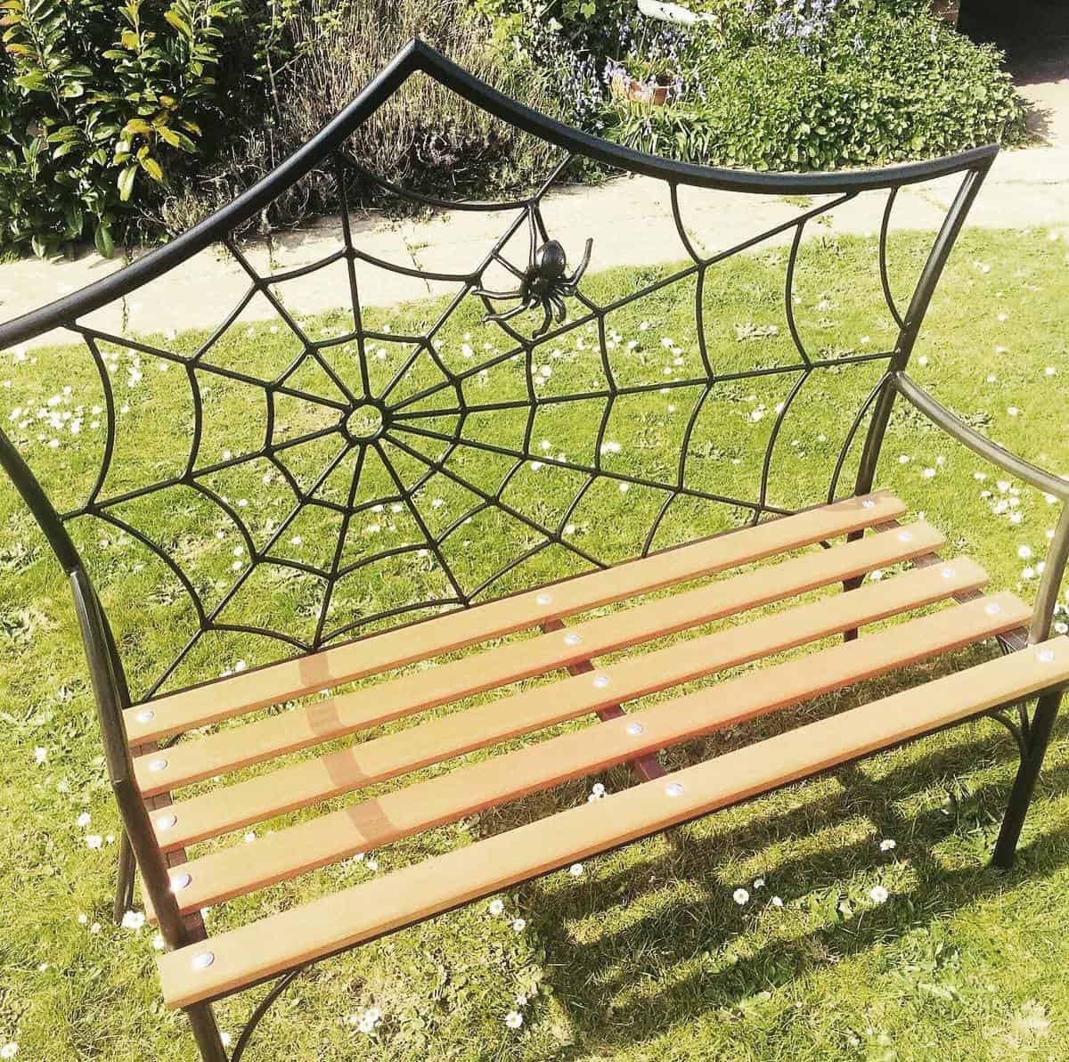 unique-garden-bench-ideas-industrial_modern_furniture wood bench with spiderweb back