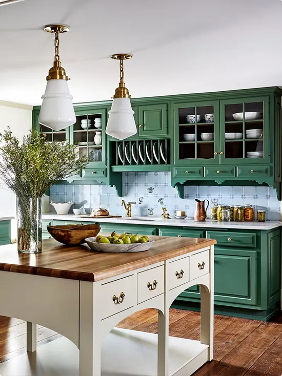 Vintage Kitchen with Floral Tile and Green Cabinets
