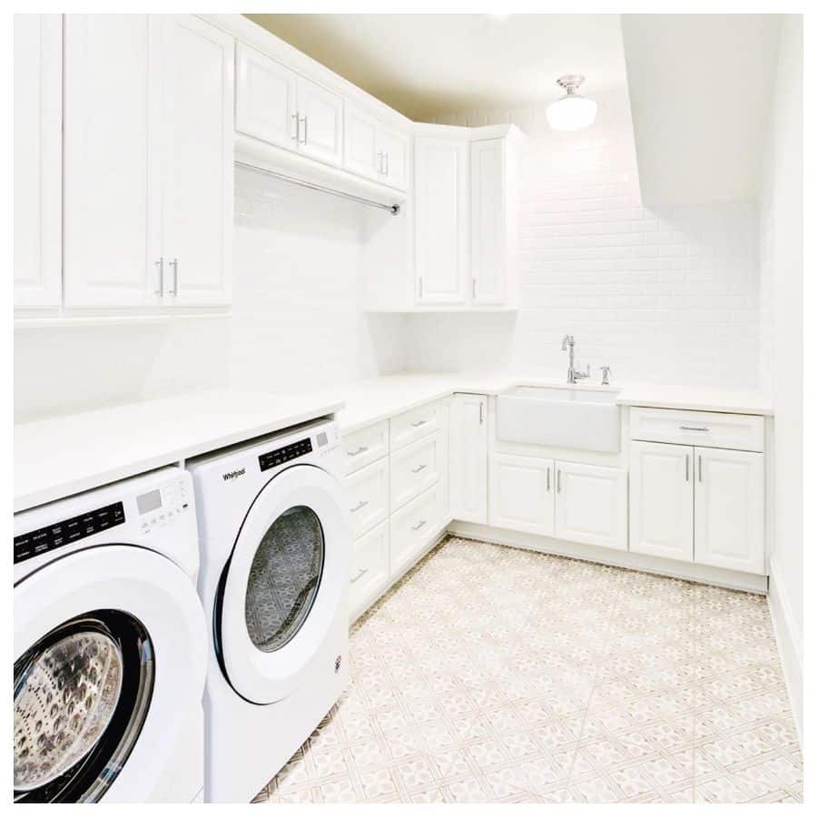 large white cabinet laundry apron sink washer and dryer