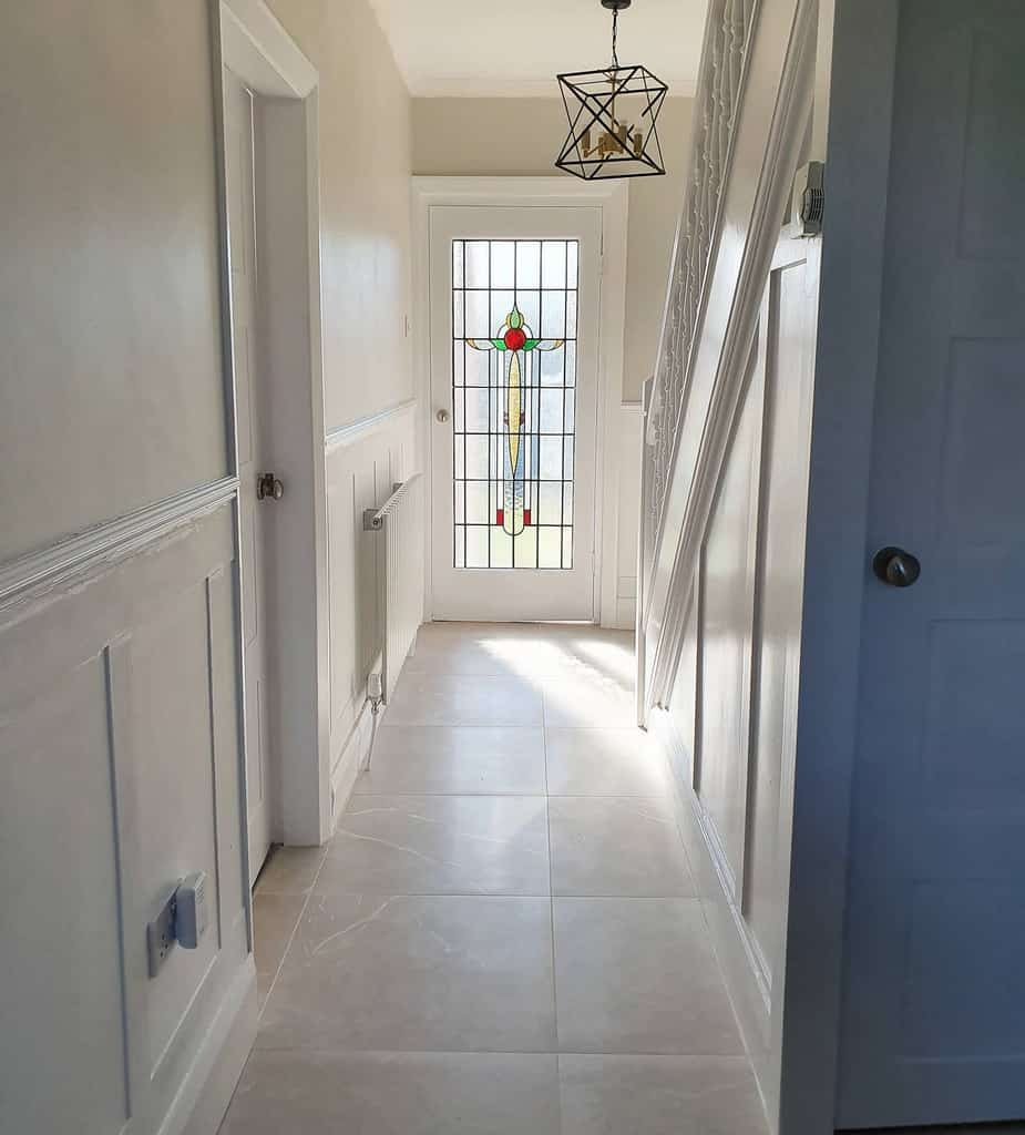 white-wall-paneling-ideas-itsinsidethatcounts white wall paneling hallway tile floor