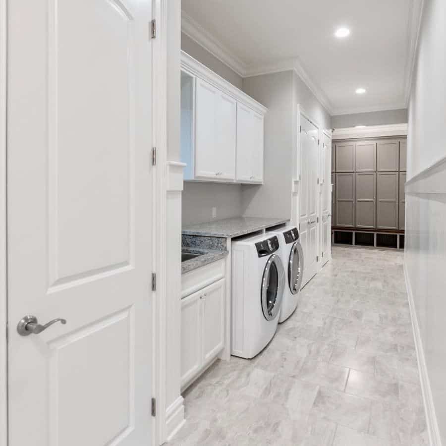 narrow laundry white cabinets washer and dryer