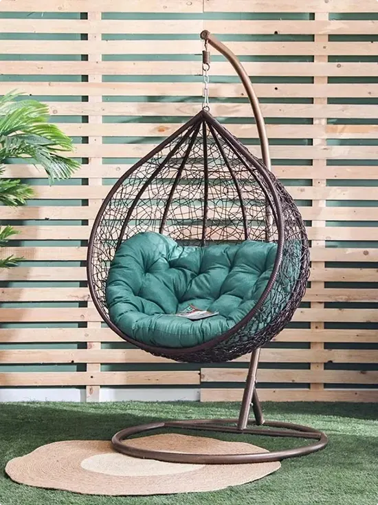 Wood Slat Wall with a Dark Rattan Egg Chair