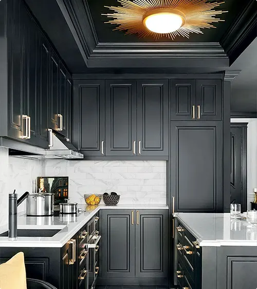A charcoal blue ceiling fixture with a starburst shape