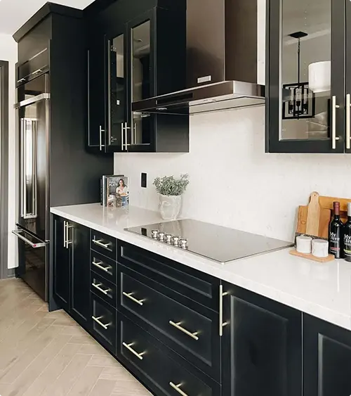 Black Cabinets and White Counters in a Galley Kitchen