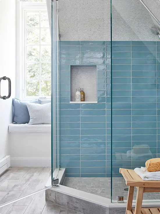 Blue Glossy Subway Tiles Under a Sloped Ceiling
