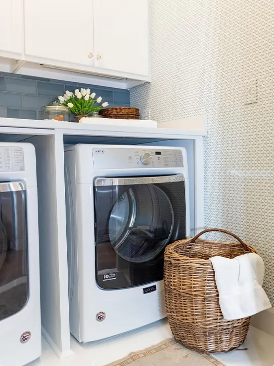 Blue Subway-Tile Backsplash and Cream Gray Dot Wallpaper Laundry Room