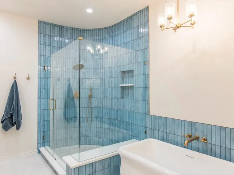 Blue Wavy Shower Tile by a Soaking Tub