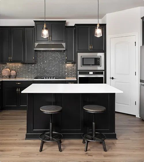 Industrial Bar Stools and Textured Backsplash Behind the Stove