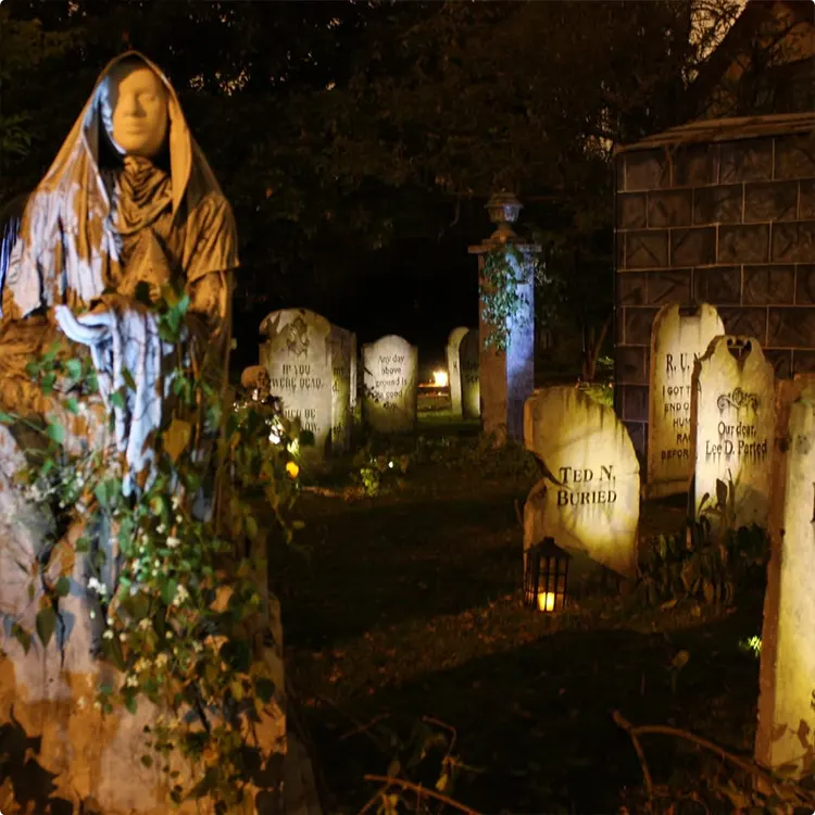 Lanternlit Hooded Figure