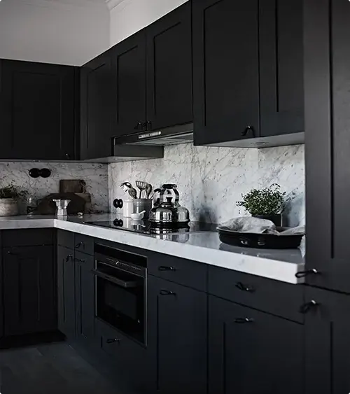 Marble Backsplash in an All Black Kitchen