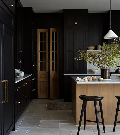 Moody Black Kitchen and Vintage Wood Door