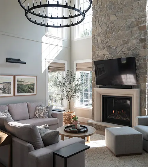 A Two-Story Stone Fireplace and Its Natural Light