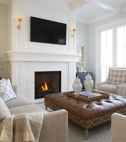 Classic White Fireplace and Coffered Ceiling