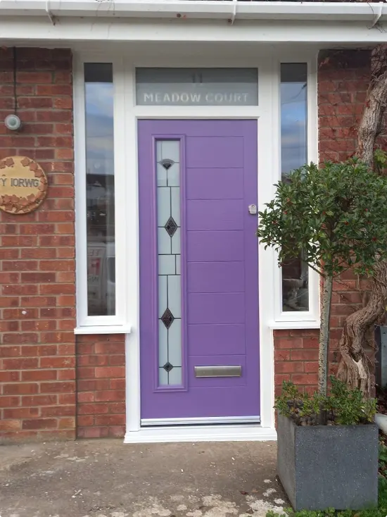 Modern Purple Door for a Red Brick House
