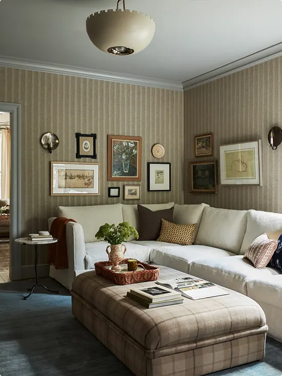 Taupe Thin-Striped Wallpaper with a Framed Artwork Gallery Wall
