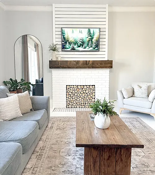 White Brick Fireplace and Stacked Wood