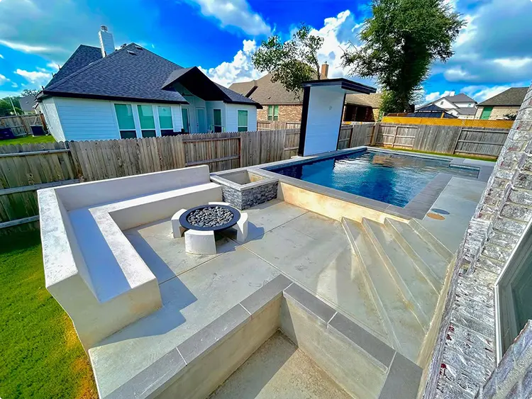 Built-In Curved Fire Pit Bench and Geometric Pool