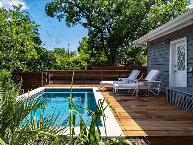 Deck-Level Rectangular Pool with Slatted Fence
