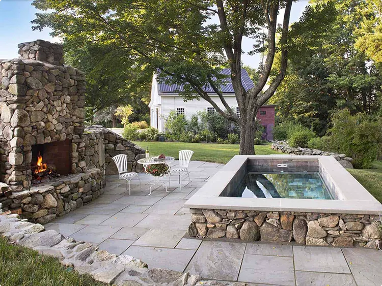 Massive Stone Fireplace beside a Rustic Plunge Pool