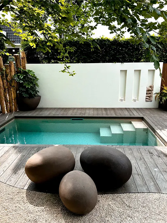 Minimalist Pool and Stone Seats with Sculptural Forms