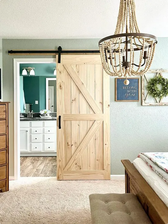 Pale Wood Barn Door and Beaded Chandelier