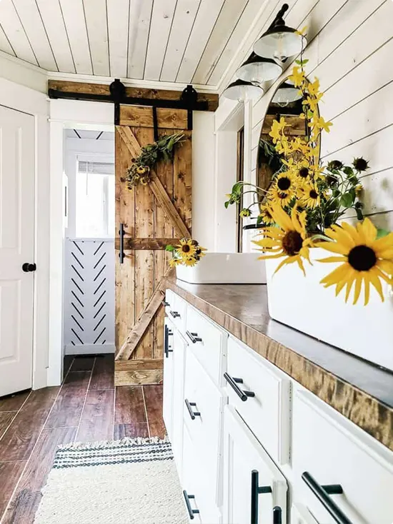 Rustic Natural Wood Barn Door in a Sunflower Bathroom
