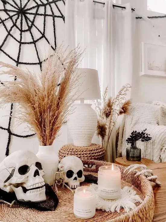 Two Different-Sized Skulls in a Cozy Halloween Corner