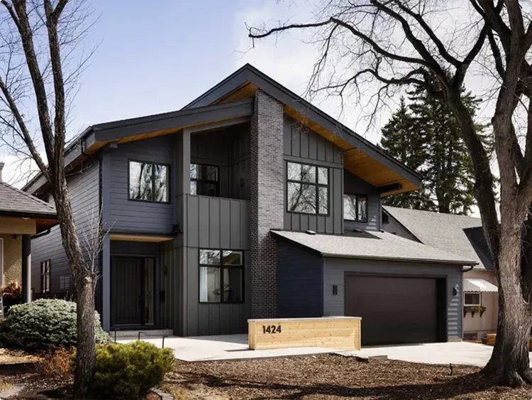 Box House in Slate Gray with a Wood Beam Under the Roofline