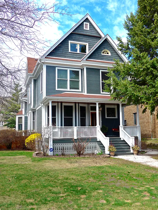 Deep Blue-Gray Victorian House with Original Details