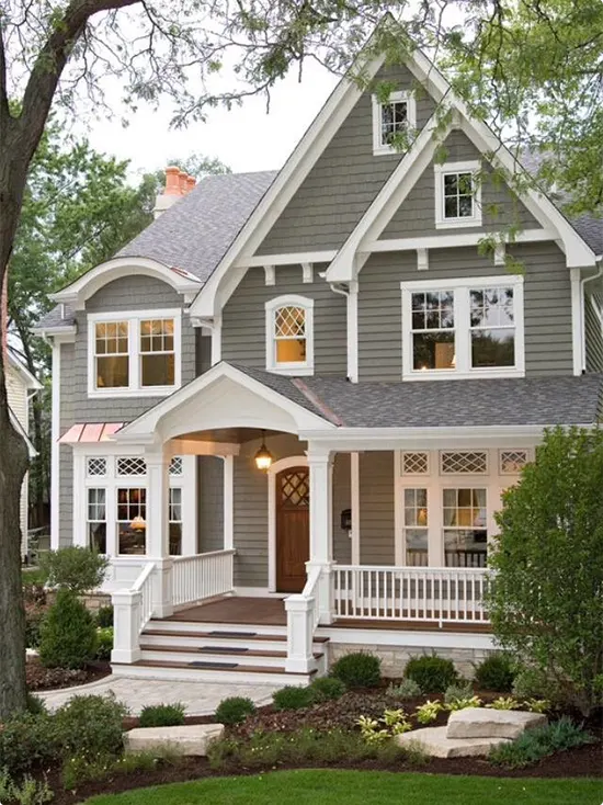 Gray-Sided Victorian House with Copper Accents