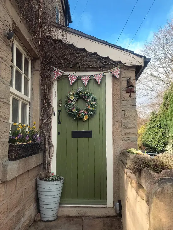 Green Cottage Door with Stone Awning