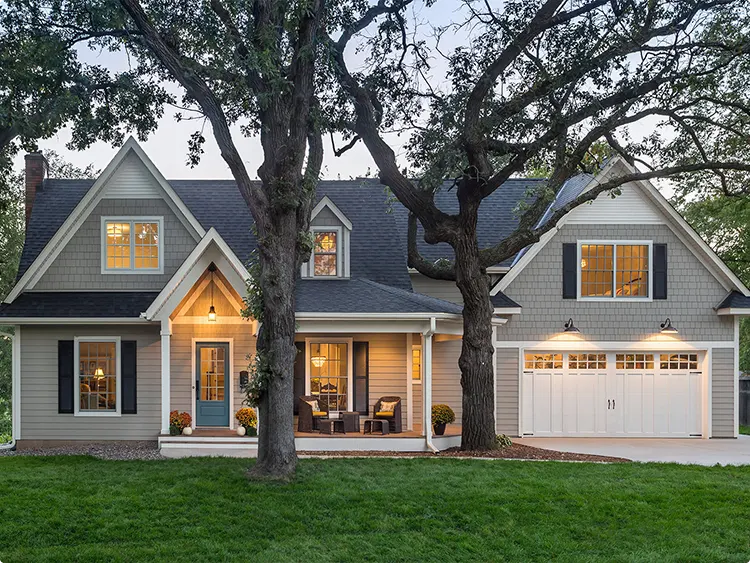 Greige Cottage with Black Shutters