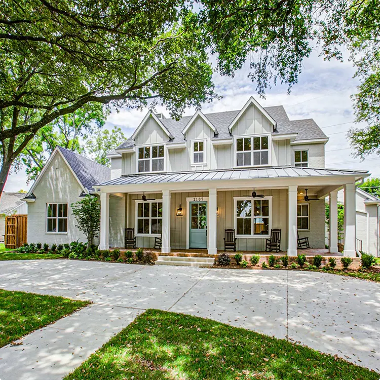 Modern Farmhouse with White-Gray Siding and Wraparound Porch