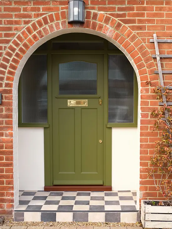 Olive Green Door in a Brick Arch
