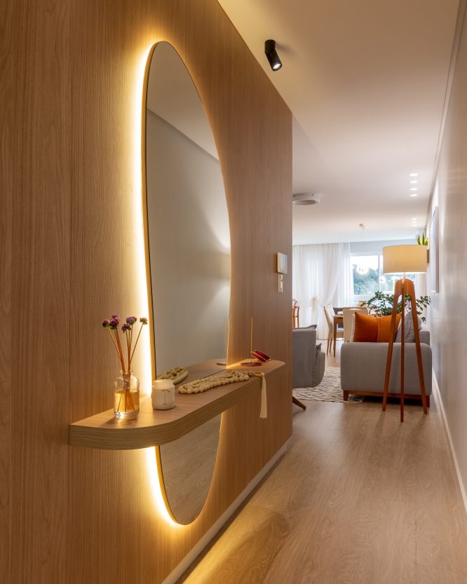 Oversized Curved Mirror in Wood Paneling
